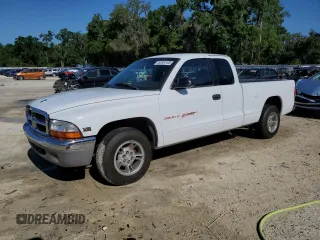 1998 Dodge Dakota SLT z VIN 1B7GL22X7WS691150, wystawiony jako Copart lot #52904105 z przebiegiem 209 423 mil mil oraz Szkoda całkowita • Salvage title. Historia ofert i sprzedaży dostępna na DreamBid. Obrazek 1.