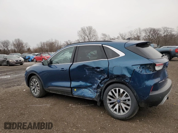 2020 Ford Escape Titanium Hybrid z VIN 1FMCU9DZXLUB95757, wystawiony jako Copart lot #47472845 z przebiegiem 39 622 mil mil oraz Szkoda całkowita • Salvage title. Historia ofert i sprzedaży dostępna na DreamBid. Obrazek 2.