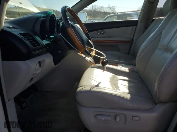 2007 Lexus RX 400h z VIN JTJGW31U172001380, wystawiony jako Copart lot #49689255 z przebiegiem 193 823 mil mil oraz Szkody całkowita. Historia ofert i sprzedaży dostępna na DreamBid. Obrazek 7.