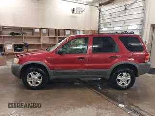 2001 Ford Escape XLT with VIN 1FMYU04101KF46809, listed as a IAAI auction lot 41664202 with 256,468 mi miles. Bid and sale history available at carsss.com. Image 14.