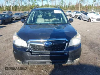 2014 Subaru Forester 2.5i Touring with VIN JF2SJAMC1EH452856, listed as a IAAI auction lot 41801406 with 148,342 mi miles. Bid and sale history available at carsss.com. Image 12.