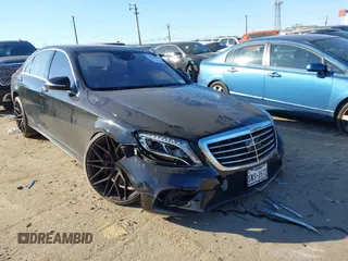 2015 Mercedes-Benz S-Class S 550 with VIN WDDUG8CB0FA077923, listed as a IAAI auction lot 41337033 with 121,957 mi miles. Bid and sale history available at carsss.com. Image 1.