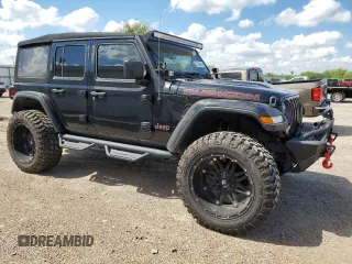2023 Jeep Wrangler Rubicon with VIN 1C4HJXFG3PW682375, listed as a Copart auction lot 73969434 with Not provided miles and Salvage title. Bid and sale history available at DreamBid. Image 4.