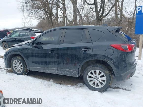 2014 Mazda CX-5 Touring with VIN JM3KE4CY8E0416590, listed as a IAAI auction lot 41619713 with 225,156 mi miles. Bid and sale history available at carsss.com. Image 15.