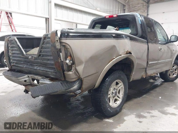 2003 Ford F-150 XL z VIN 1FTRX18L73NA93596, wystawiony jako IAAI lot #42069903 z przebiegiem 283 361 mil mil oraz . Historia ofert i sprzedaży dostępna na DreamBid. Obrazek 6.