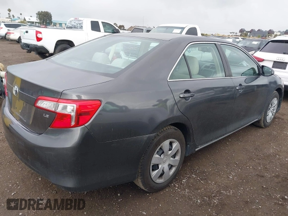 2014 Toyota Camry L with VIN 4T1BF1FK5EU403313, listed as a IAAI auction lot 42141338 with 185,925 mi miles and . Bid and sale history available at DreamBid. Image 4.