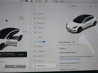 2020 Tesla Model 3 Standard Range Plus with VIN 5YJ3E1EA7LF659172, listed as a IAAI auction lot 42017026 with 32,104 mi miles. Bid and sale history available at carsss.com. Image 7.