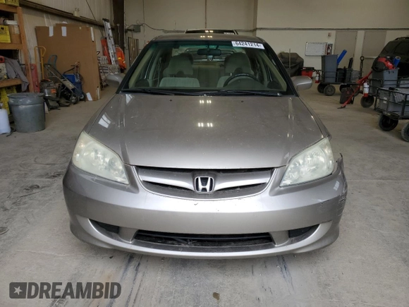 2004 Honda Civic LX with VIN 2HGES16694H910914, listed as a Copart auction lot 64241214 with 150,628 mi miles and Salvage Title. Bid and sale history available at DreamBid. Image 5.