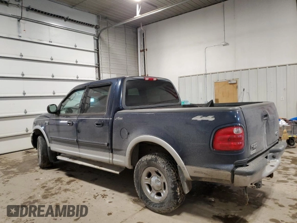 2002 Ford F-150 XLT with VIN 1FTRW08L02KE06257, listed as a Copart auction lot 45004605 with 189,003 mi miles and Salvage Title. Bid and sale history available at carsss.com. Image 2.