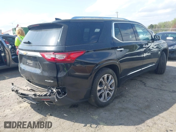 2020 Chevrolet Traverse Premier with VIN 1GNERKKW0LJ123828, listed as a IAAI auction lot 41947690 with 91,905 mi miles and . Bid and sale history available at DreamBid. Image 4.