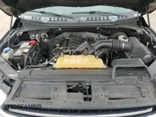 2019 Ford F-150 XL z VIN 1FTEW1C52JKC56969, wystawiony jako Copart lot #71099975 z przebiegiem 129 423 mil mil oraz Szkoda całkowita • Salvage title. Historia ofert i sprzedaży dostępna na DreamBid. Obrazek 13.