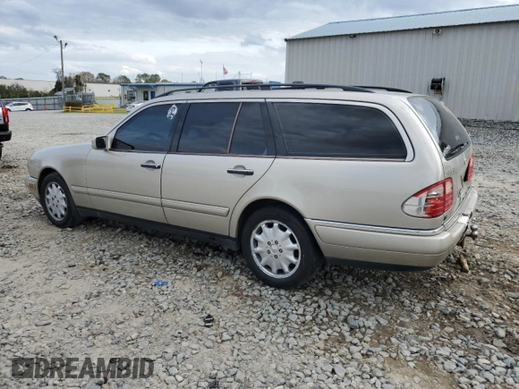1998 Mercedes-Benz E-Class with VIN WDBJH65F7WA546101, listed as a Copart auction lot 47098945 with 227,453 mi miles and Salvage Title. Bid and sale history available at carsss.com. Image 2.