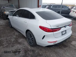 2021 BMW 2 Series 228i xDrive with VIN WBA73AK07M7H56978, listed as a IAAI auction lot 41215710 with 77,965 mi miles and . Bid and sale history available at DreamBid. Image 3.