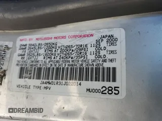 2001 Mitsubishi Montero XLS z VIN JA4MW31R31J022014, wystawiony jako Copart lot #59293735 z przebiegiem 134 532 mil mil oraz Czysty tytuł • Clean title. Historia ofert i sprzedaży dostępna na DreamBid. Obrazek 13.
