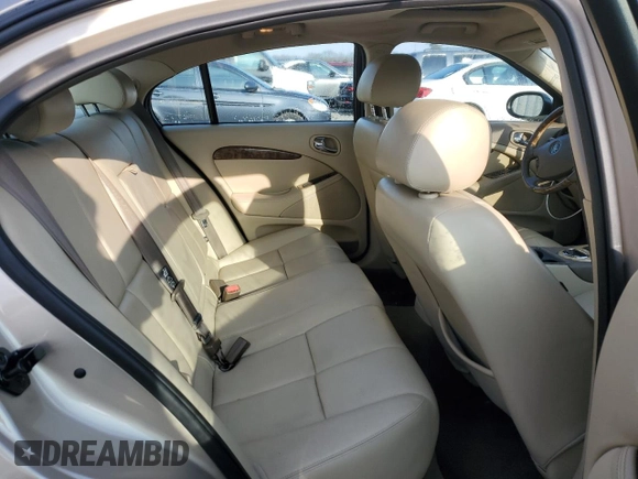 2005 Jaguar S-Type with VIN SAJWA01T55FN14254, listed as a Copart auction lot 86994974 with 126,484 mi miles and Salvage Title. Bid and sale history available at DreamBid. Image 10.