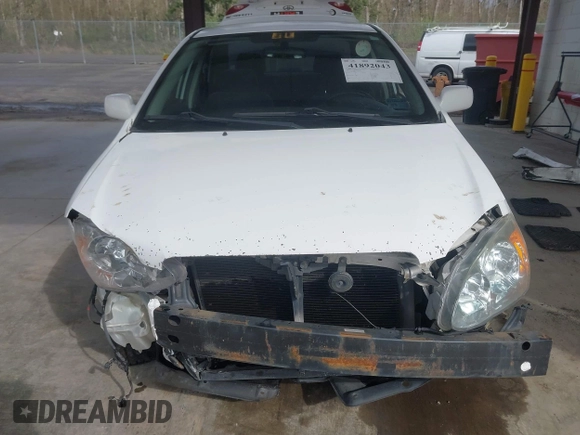 2003 Toyota Corolla CE with VIN 1NXBR32E13Z035938, listed as a IAAI auction lot 41892043 with 236,708 mi miles and . Bid and sale history available at DreamBid. Image 6.