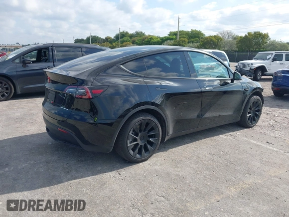 2024 Tesla Model Y Long Range z VIN 7SAYGDEE9RA293261, wystawiony jako IAAI lot #42118735 z przebiegiem 11 454 mil mil oraz . Historia ofert i sprzedaży dostępna na DreamBid. Obrazek 4.