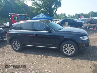 2016 Audi Q5 Premium z VIN WA1C2AFP5GA051381, wystawiony jako IAAI lot #42559055 z przebiegiem 132 841 mil mil oraz . Historia ofert i sprzedaży dostępna na DreamBid. Obrazek 13.