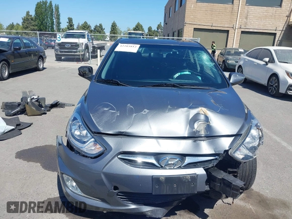 2012 Hyundai Accent SE z VIN KMHCU5AE5CU022142, wystawiony jako IAAI lot #42203812 z przebiegiem 89 196 mil mil oraz . Historia ofert i sprzedaży dostępna na DreamBid. Obrazek 13.