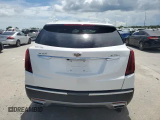 2021 Cadillac XT5 FWD Premium Luxury z VIN 1GYKNCR44MZ106982, wystawiony jako Copart lot #62234455 z przebiegiem 93 079 mil mil oraz Szkoda całkowita • Salvage title. Historia ofert i sprzedaży dostępna na DreamBid. Obrazek 6.