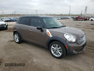 2013 MINI Countryman z VIN WMWZB3C53DWM31457, wystawiony jako Copart lot #55528885 z przebiegiem 137 279 mil mil oraz Szkoda całkowita • Salvage title. Historia ofert i sprzedaży dostępna na DreamBid. Obrazek 4.