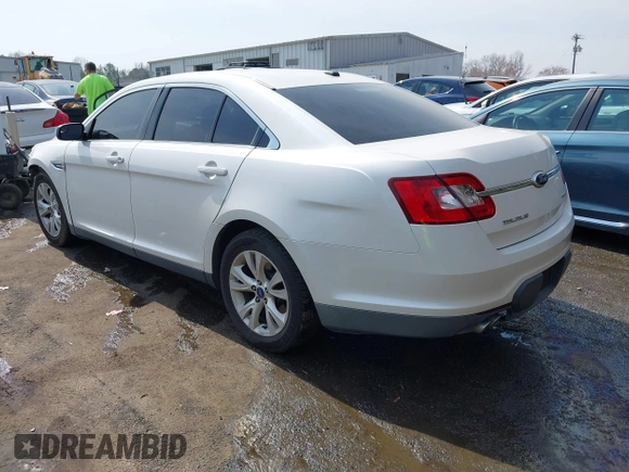 2012 Ford Taurus SEL with VIN 1FAHP2EW9CG121263, listed as a IAAI auction lot 41785838 with 185,433 mi miles and . Bid and sale history available at DreamBid. Image 3.