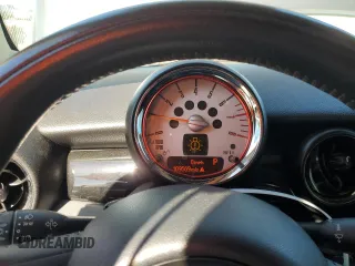 2012 MINI Clubman z VIN WMWZF3C57CT488782, wystawiony jako Copart lot #47300465 z przebiegiem 109 569 mil mil oraz Szkoda całkowita • Salvage title. Historia ofert i sprzedaży dostępna na DreamBid. Obrazek 9.