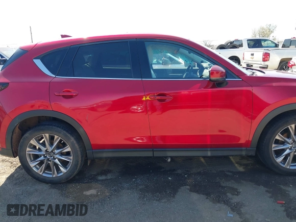 2019 Mazda CX-5 Grand Touring with VIN JM3KFADM5K1556917, listed as a IAAI auction lot 41706323 with 77,804 mi miles. Bid and sale history available at carsss.com. Image 13.