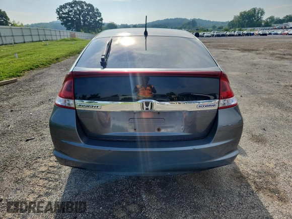 2012 Honda Insight LX with VIN JHMZE2H52CS005731, listed as a Copart auction lot 64077625 with 157,026 mi miles and Non repairable. Bid and sale history available at DreamBid. Image 6.