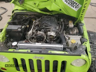 2013 Jeep Wrangler Unlimited Rubicon 10th Anniversary z VIN 1C4HJWFGXDL526535, wystawiony jako Copart lot #85209824 z przebiegiem Nie podano mil oraz Szkoda całkowita • Salvage title. Historia ofert i sprzedaży dostępna na DreamBid. Obrazek 12.