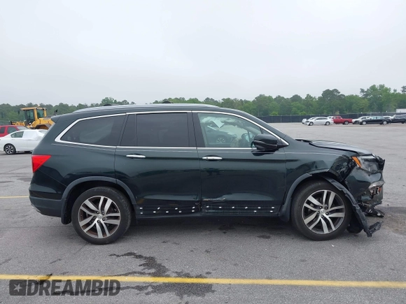 2017 Honda Pilot Touring with VIN 5FNYF6H93HB068846, listed as a IAAI auction lot 42083050 with 108,787 mi miles and . Bid and sale history available at DreamBid. Image 13.