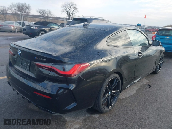 2021 BMW 4 Series M440i xDrive with VIN WBA13AR05MCG58597, listed as a IAAI auction lot 41475262 with 42,626 mi miles and . Bid and sale history available at DreamBid. Image 4.