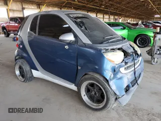 2010 Smart fortwo Pure с VIN WMEEJ3BA1AK360041, выставлен на аукционе Copart как лот 59594055 с пробегом Не указан миль и Списание • Salvage title. История ставок и продаж доступна на DreamBid. Изображение 4.