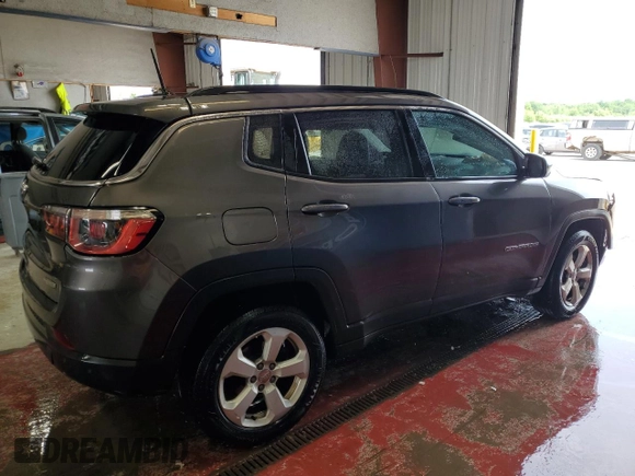 2018 Jeep Compass Altitude with VIN 3C4NJDBB9JT457242, listed as a Copart auction lot 60886385 with 143,467 mi miles and Salvage title. Bid and sale history available at DreamBid. Image 3.
