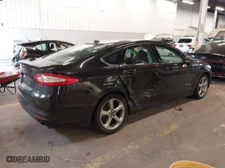 2014 Ford Fusion SE Hybrid with VIN 3FA6P0LU8ER151329, listed as a IAAI auction lot 41643515 with 121,161 mi miles. Bid and sale history available at carsss.com. Image 4.