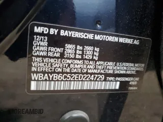 2014 BMW 7 Series 750i xDrive with VIN WBAYB6C52ED224729, listed as a Copart auction lot 77781224 with 0 mi miles and Salvage Title. Bid and sale history available at carsss.com. Image 12.