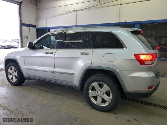 2011 Jeep Grand Cherokee Limited with VIN 1J4RR5GG3BC575251, listed as a Copart auction lot 49248985 with 199,962 mi miles and Salvage Title. Bid and sale history available at carsss.com. Image 2.