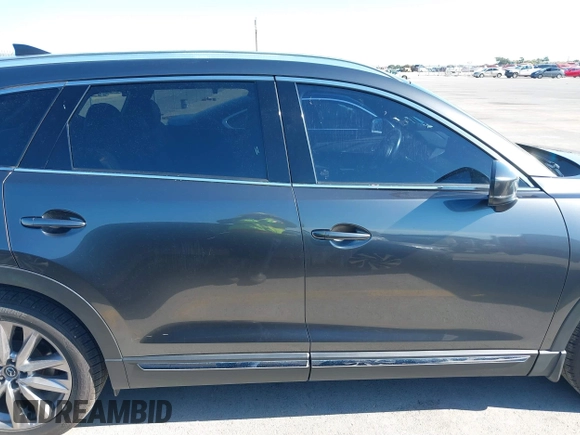 2020 Mazda CX-9 Grand Touring with VIN JM3TCADY1L0417651, listed as a IAAI auction lot 42334867 with 105,236 mi miles and . Bid and sale history available at DreamBid. Image 13.
