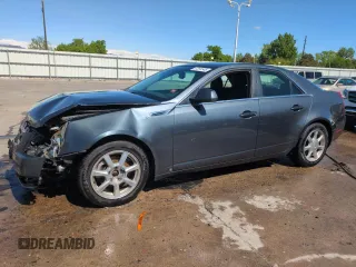 2009 Cadillac CTS AWD z VIN 1G6DG577290107953, wystawiony jako Copart lot #57291545 z przebiegiem 125 828 mil mil oraz Szkoda całkowita • Salvage title. Historia ofert i sprzedaży dostępna na DreamBid. Obrazek 1.