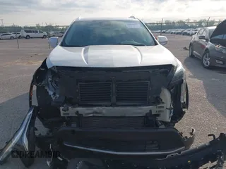 2019 Cadillac XT4 FWD Premium Luxury with VIN 1GYFZCR42KF228986, listed as a IAAI auction lot 42019157 with 79,397 mi miles and . Bid and sale history available at DreamBid. Image 12.