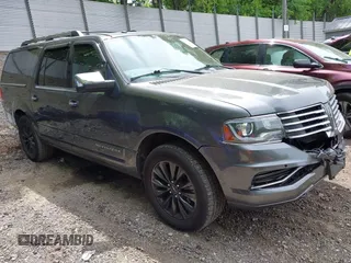 2015 Lincoln Navigator z VIN 5LMJJ3JT3FEJ07172, wystawiony jako IAAI lot #42313343 z przebiegiem 189 807 mil mil oraz . Historia ofert i sprzedaży dostępna na DreamBid. Obrazek 1.