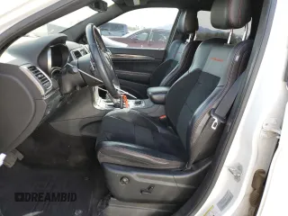 2017 Jeep Grand Cherokee Trailhawk with VIN 1C4RJFLT1HC729163, listed as a Copart auction lot 51115745 with 213,292 mi miles and Salvage title. Bid and sale history available at DreamBid. Image 7.