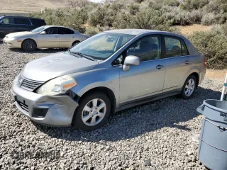 2007 Nissan Versa 1.8 S with VIN 3N1BC11E17L446450, listed as a Copart auction lot 52631415 with 121,006 mi miles and Salvage Title. Bid and sale history available at carsss.com. Image 1.