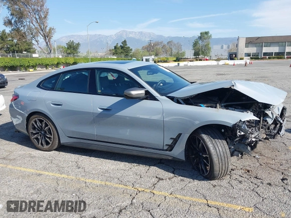 2024 BMW i4 M50 z VIN WBY33AW06RFS45489, wystawiony jako IAAI lot #41981614 z przebiegiem 35 713 mil mil oraz . Historia ofert i sprzedaży dostępna na DreamBid. Obrazek 13.