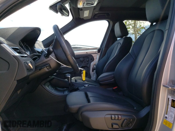 2018 BMW X1 sDrive28i with VIN WBXHU7C38J3H42948, listed as a Copart auction lot 52061793 with 26,991 mi miles and . Bid and sale history available at DreamBid. Image 7.