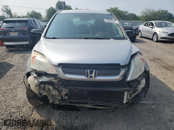 2009 Honda CR-V LX z VIN 5J6RE48319L048126, wystawiony jako Copart lot #59668385 z przebiegiem 191 638 mil mil oraz Szkoda całkowita • Salvage title. Historia ofert i sprzedaży dostępna na DreamBid. Obrazek 5.