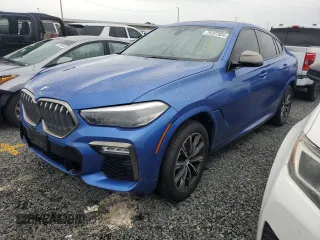 2020 BMW X6 M50i with VIN 5UXCY8C02L9B20285, listed as a Copart auction lot 74127524 with 0 mi miles and Non Repairable. Bid and sale history available at carsss.com. Image 1.