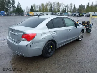 2012 Subaru Impreza Sedan 2.0i Premium with VIN JF1GJAD64CH012406, listed as a IAAI auction lot 41993378 with 96,706 mi miles. Bid and sale history available at carsss.com. Image 4.