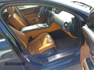 2013 Jaguar XJ Supercharged with VIN SAJWA2GE8DMV43164, listed as a IAAI auction lot 42549807 with 59,744 mi miles and . Bid and sale history available at DreamBid. Image 5.