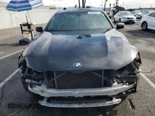 2017 BMW 7 Series 740i with VIN WBA7E2C59HG739693, listed as a Copart auction lot 42599835 with 90,061 mi miles and Salvage Title. Bid and sale history available at carsss.com. Image 5.
